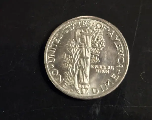 A coin that is sitting on the table